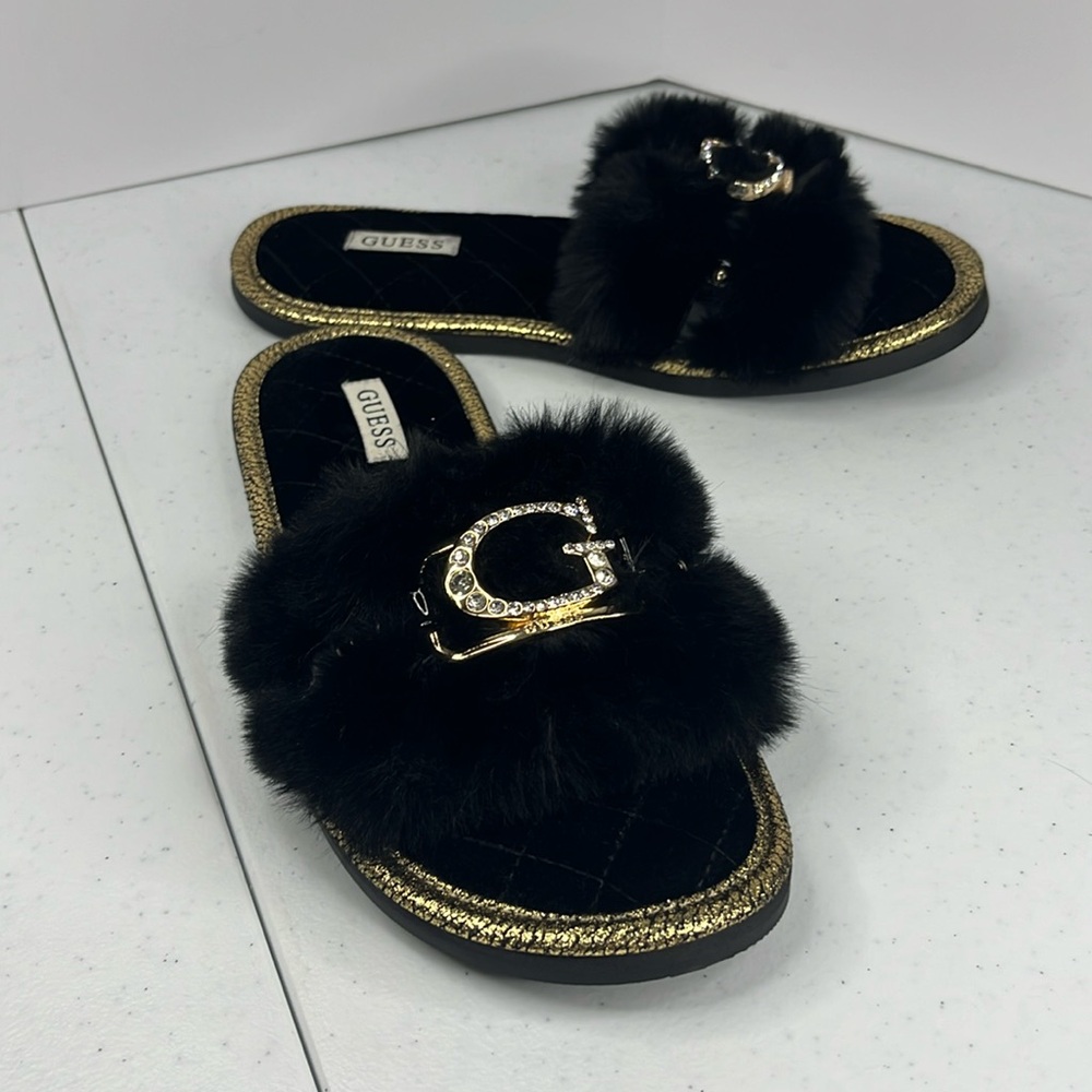 Guess black with gold emblem slippers